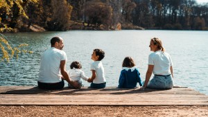 Family enjoying summer together at a Minnesota lake house